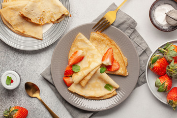 French Crepe with Berries for Chandeleur. Top view. Copy space. Flat lay
