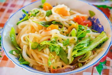 Vietnamese noodle Mi Quang at Tra Que vegetable village, Hoi An old town, Vietnam