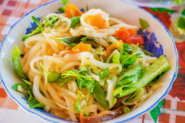 Vietnamese noodle Mi Quang at Tra Que vegetable village, Hoi An old town, Vietnam