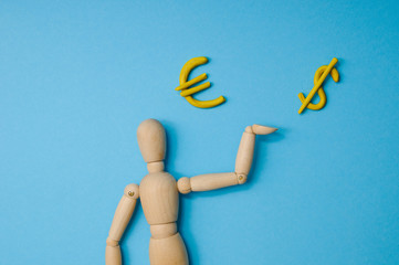 Wooden mannequin with empty miniature shopping cart running for sales on red background. Mockup for shopping, sales, black friday, copy space, side view.