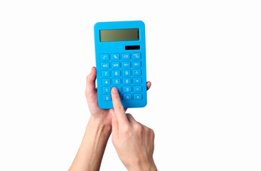 Hand holds blue calculator Isolated on a white background. - obrazy, fototapety, plakaty