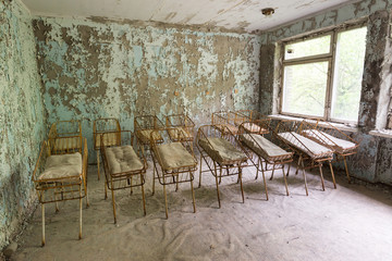 Cradles in abandoned hospital in Chernobyl
