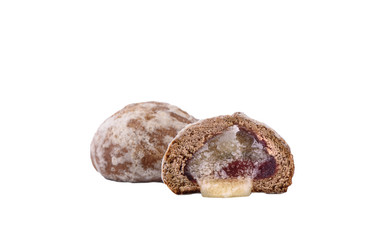 Honey flows from a gingerbread cut in half.