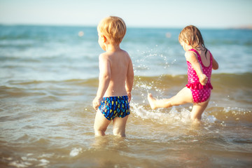 Funny twins at the sea