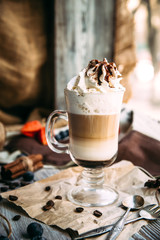 Sweet appetizing mocaccino coffee in a glass
