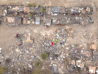 Aerial top-down view high altitude of slum a heavily populated urban informal settlement...