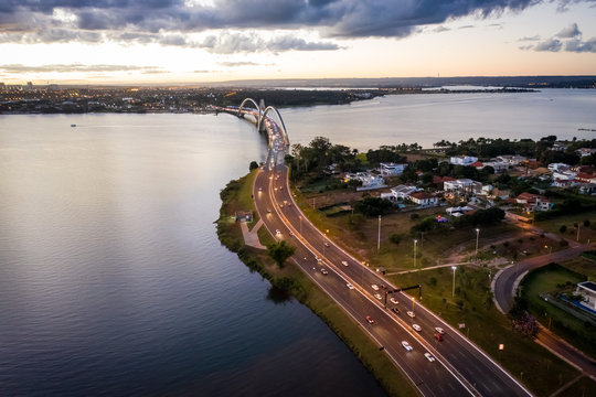 Brasilia`s Juscelino Kubitschek bridge and lake Paranoa at sunset