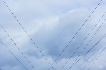 Beautiful view of clouds and electrical wires 