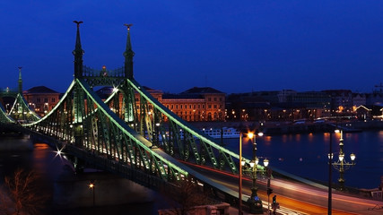 Liberty Bridge at night in Budapest from Gellert Hill view, with slow shutter speed.