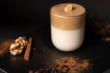 Dalgona coffee, soft, sparkling coffee with milk and a touch of cinnamon