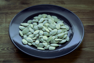 Pumpkin seeds on a plate