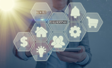 Writing note showing Reward Performance. Business concept for Appraisal Recognize workers Relative...