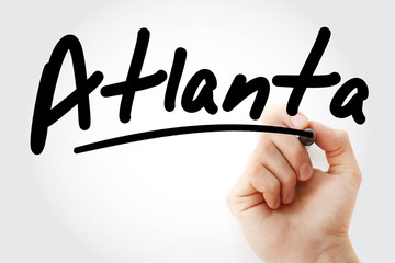 Hand writing Atlanta with marker, concept background