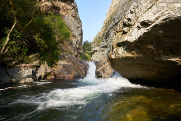 Fototapeta na wymiar Amazing waterfall in Fragas de Sao Simao, Portugal
