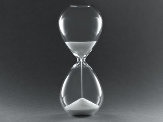 Hourglass on dark background. Symbol of passing time, concept for business deadline, urgency and...