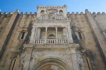 Fototapeta na wymiar Old church cathedral Se Velha tower entrance in Coimbra, Portugal