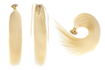 Set of three fake women hair extensions in tails, isolated on white background. Light blonde or gold color. and different attachment types.