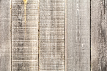 grey wooden background made of old pine boards.