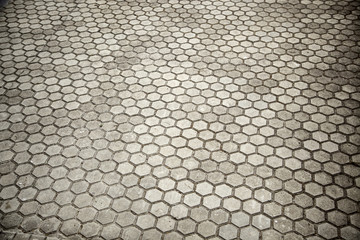 Wet cobblestone floor