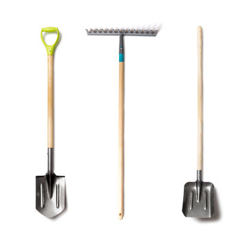 Set of garden tolls isolated. Spade shovel, rake and shovel with wood handle on white background