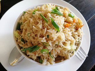 delicious rice with vegetables served in a Cup in an Indian cafe. healthy and delicious food