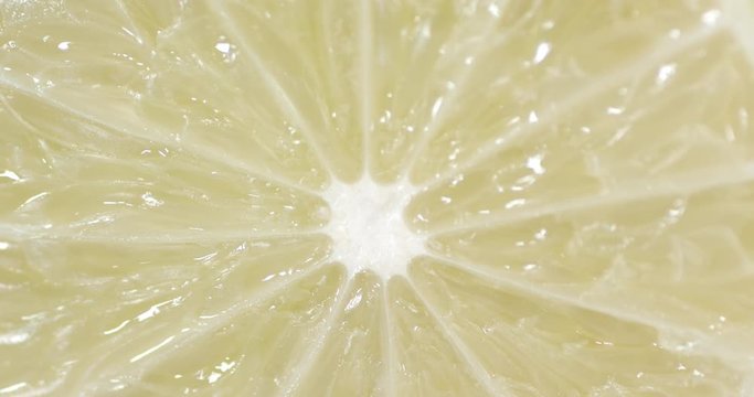 Fragrant slice of lime slowly rotating.