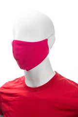 protective face mask against coronavirus on the face of a mannequin, red isolated on a white background