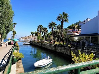 Fototapeta premium boats on the river in a village