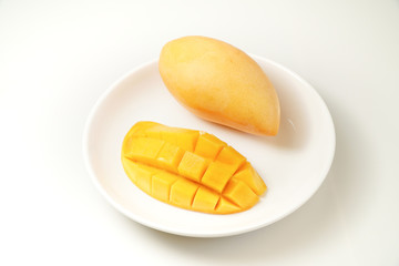 Fresh Mango on white plate and white background