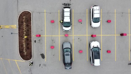 Aerial Store Employees Delivering Packages To Vehicles Practising Social Distancing During Fear Crisis Panic  - Powered by Adobe