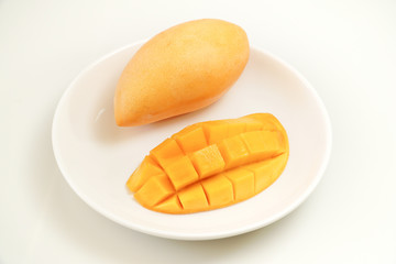Fresh Mango on white plate and white background