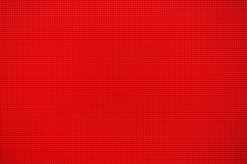 Red surface with tiny dots