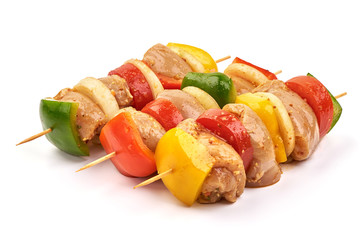 Raw chicken kebab and fresh vegetables, ready to cook, BBQ, isolated on white background