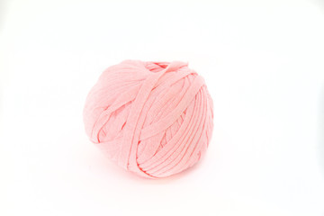 pink wool ball on white background