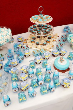 Party decoration with sweet, candy, confection, sugar. Baby tea. It's a boy. Blue theme.