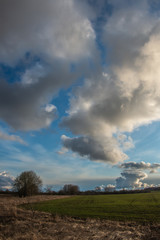 Fototapeta na wymiar evening landscape with rain Cumulus clouds