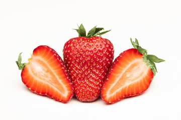 Fresh big strawberries on a white surface