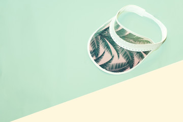 Holographic trendy sun visor headdress concept summer and fashion copy space