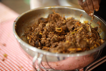 Kerala style beef dry fry. delicious spicy Beef fry in banquet table with chafing dish heaters. It goes well with ghee rice, kappa,appam, parotta, puttu, Kerala style cuisine ,beef roast.India