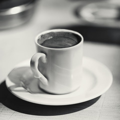 cup of Turkish coffee on the table (black and white)