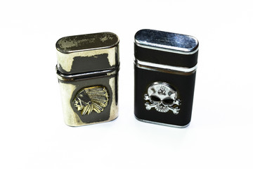 Reusable steel lighters. Creative lighters on white background.