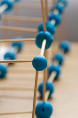 Plasticine and toothpicks building kid's game homemade close up perspective