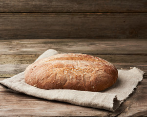 baked round rye flour bread