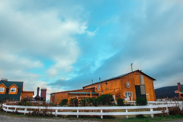 Fototapeta na wymiar Barn and blue sky in Ushuaia