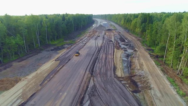 Deforestation development transport road. Aerial View of Highway construction.