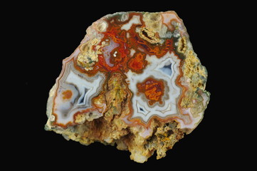 Agate with many colorful inclusions. Ribbons colored with metal oxides are visible. Origin: Rudno...