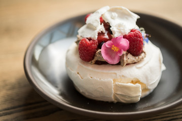 Pavlov cake meringue with fruits and berries