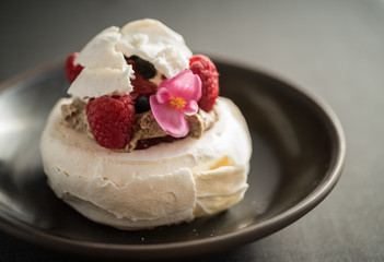 Pavlov cake meringue with fruits and berries