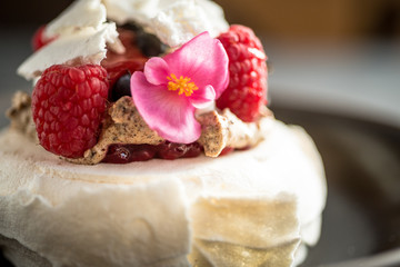Pavlov cake meringue with fruits and berries