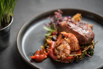 Grilled duck breast with grilled tiger prawns